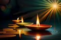 Burning Diwali diya oil lamp floating down the river