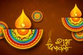 Burning diya on Diwali Holiday background for light festival of India with message in Hindi meaning Happy Dipawali