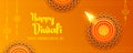 Burning diya on happy Diwali Holiday background for light festival of India