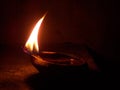 A burning diya