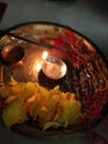 Burning diya for worship on rakhi festival