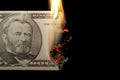 Burning dollar bill