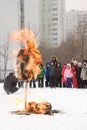 Burning effigy Maslency. Winter snow. We are seeing winter