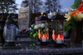 Burning electric candles in the evening at the cemetery. All Saints Royalty Free Stock Photo
