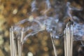 Burning Embossed in an incense pot.