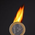 Burning euro coin Royalty Free Stock Photo