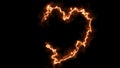 A burning, fiery heart on a black background. A figure in the form of a heart with fire. heart light with sparks background Royalty Free Stock Photo