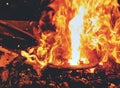 Burning fire in the blacksmith coal forge. Red hot forging metal
