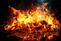 Burning fire close up bright orange and red flames on a dark background Royalty Free Stock Photo