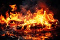 Burning fire close up bright orange and red flames on a dark background Royalty Free Stock Photo