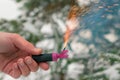 Burning Firecracker in a Hand. Sparks and Smoke of Petard Royalty Free Stock Photo