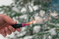 Burning Firecracker in a Hand. Sparks and Smoke of Petard Royalty Free Stock Photo