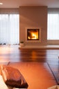 Burning fireplace in cozy interior