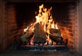 Burning fireplace, real wood logs, cozy warm home at xmas time Royalty Free Stock Photo