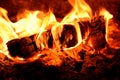 Burning firewood in stoves Royalty Free Stock Photo