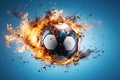 burning football soccer ball on fire is flying on blue isolated background. Sport burn element concept Royalty Free Stock Photo