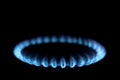 Burning gas stove with a blue flame Royalty Free Stock Photo