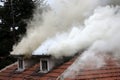 Burning house roof Royalty Free Stock Photo