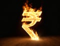 Burning incandescent rupee sign set on fire on black background