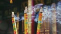 Burning incense sticks in Buddhist temple