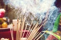 Burning incense sticks Embossed in an incense pot. There is a lot of smoke Royalty Free Stock Photo