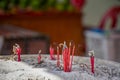 Burning incense sticks and smoke in an incense pot. Incense for Royalty Free Stock Photo