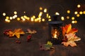 Burning lantern on a wooden table