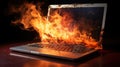 Burning laptop and keyboard, equipment fire due to faulty battery and wiring. Laptop Computer setting the world on fire