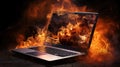 Burning laptop and keyboard, equipment fire due to faulty battery and wiring. Laptop Computer setting the world on fire.