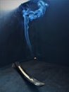 Burning life, light and darkness, incense and smoke Royalty Free Stock Photo