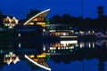 Burning lights of night establishments near the lake