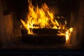 burning logs in the fire of a barbecue or stove or fireplace Royalty Free Stock Photo