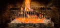 Burning logs in a Winter fireplace Royalty Free Stock Photo