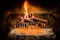 Burning logs in a Winter fireplace Royalty Free Stock Photo