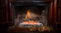 Burning logs in a Winter fireplace Royalty Free Stock Photo