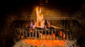 Burning logs in a Winter fireplace Royalty Free Stock Photo