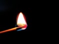 Burning match in hand on neutral background Royalty Free Stock Photo