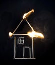 Burning match house Royalty Free Stock Photo