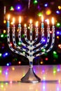 A burning menorah with nine candles is tradition during Hanukkah.
