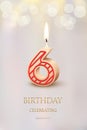 Burning number 6 birthday candle with birthday celebration text on light blurred background. Vector sixth birthday