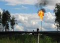 Burning oil gas flare Royalty Free Stock Photo