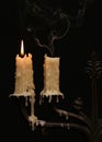 Burning old candle vintage Silver bronze candlestick. Isolated Black Background. Royalty Free Stock Photo