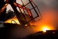 Burning out remains of a wooden house at night. Fire in the private sector. Burning building Royalty Free Stock Photo