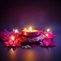 Burning pink candles in the shape of a Lotus flower on a dark background isolated. Diwali, the dipawali Indian festival of light