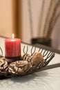 Burning red candle in glass holders Royalty Free Stock Photo