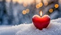 Burning red candle in shape of heart on the snow, blurred background. Winter love holiday. Valentine\'s Day Royalty Free Stock Photo