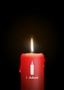 Burning Red Candle - 1th Sunday of Advent - Isolated Candlelight