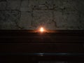 Burning  red candles in a church in Massa Marittima in Tuscany Royalty Free Stock Photo