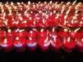 Burning red candles. Candles light background. Candle flame at night.