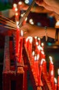 Burning red chinese candle in temple